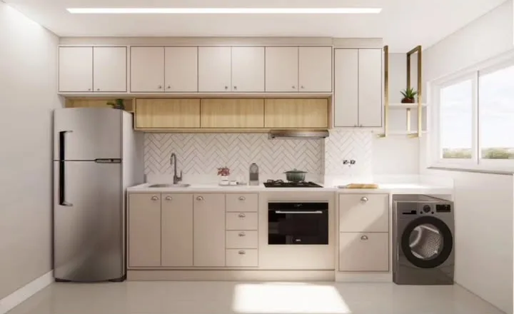 Cozinha clara com armários planejados